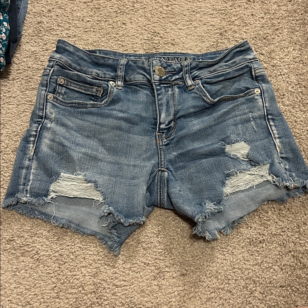 AE distressed midi shorts